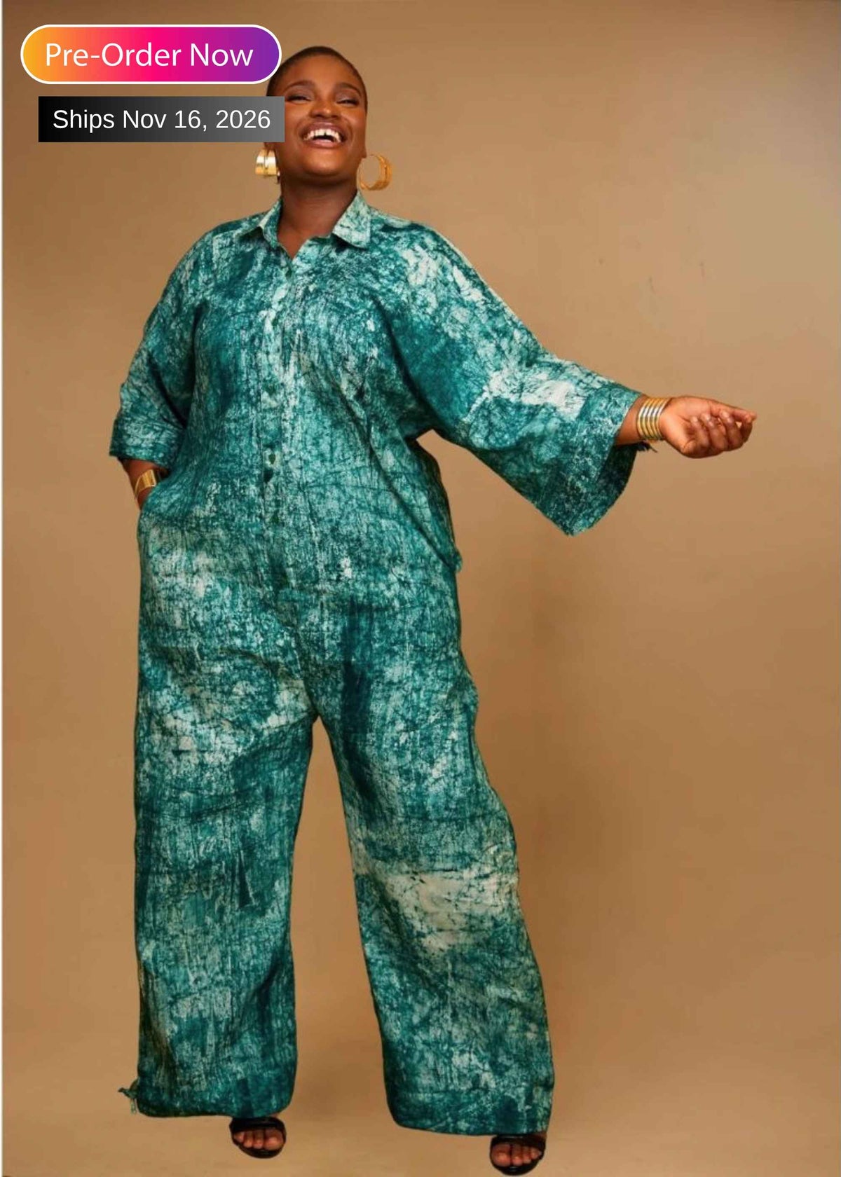 Woman wearing the Splash hand-dyed batik wide-leg jumpsuit – African print cotton jumpsuit by Zanaani